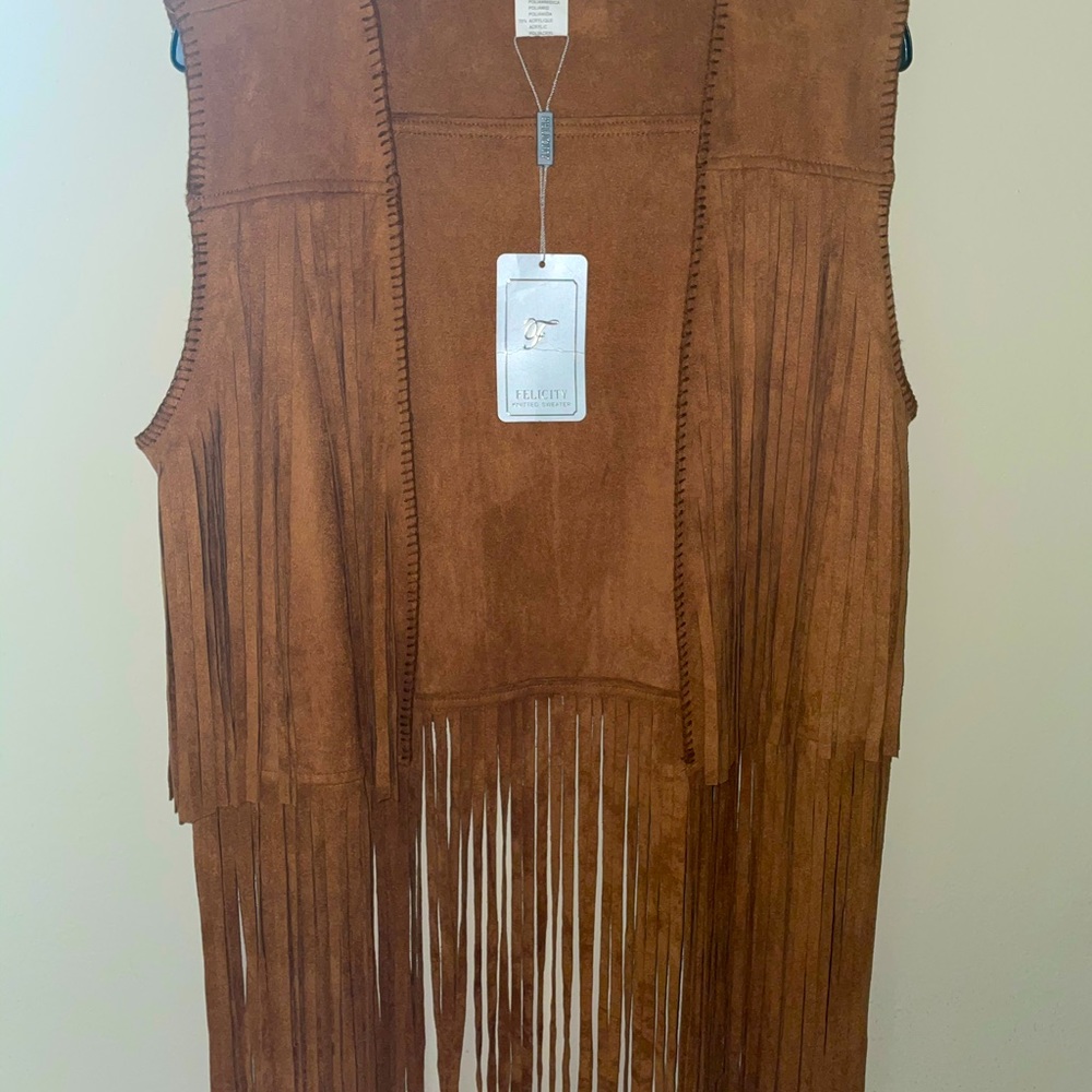 Brown cow hide vest with tassels